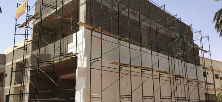 Installing Stone Veneer over an EIFS System on the exterior envelope of a building